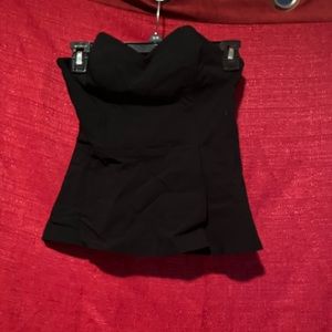 Express zip up sleeveless top.